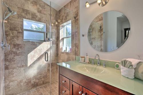 a bathroom with a sink and a shower with a mirror at Modern 2 Bd and Loft Getaway Less Than 9 Mi to Dtwn! in Miami