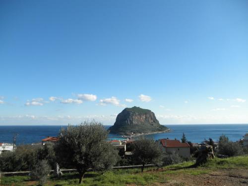 a view of a small island in the ocean at Villa Cazala in Monemvasia