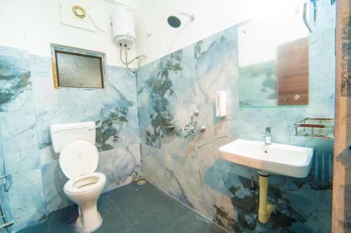 Ένα μπάνιο στο Dibrugarh Tea Residency