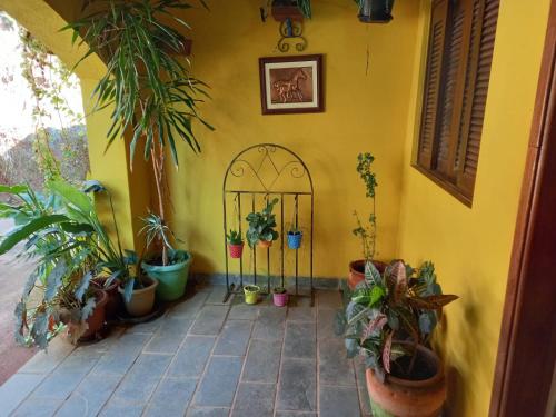 Gambar di galeri bagi Casa de campo serrana, alegre e com piscina di Lindóia
