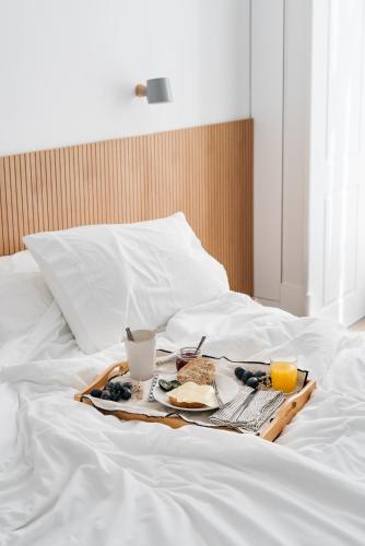 Postel nebo postele na pokoji v ubytování The Lisboans Apartments