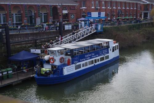 a ferry boat is docked at a dock at Chandeliers 6 in Shrewsbury
