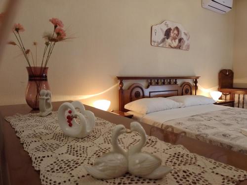 Katil atau katil-katil dalam bilik di Risveglio al Sole