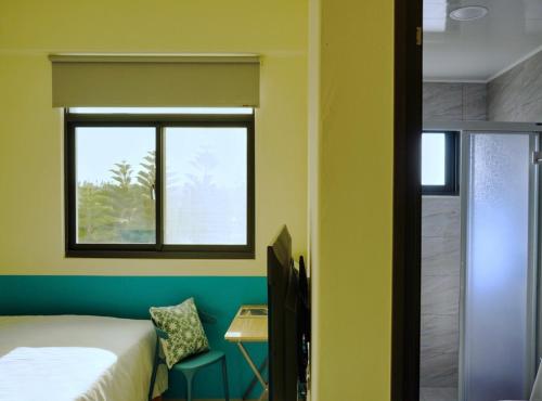Katil atau katil-katil dalam bilik di RUN aWAY guesthouse