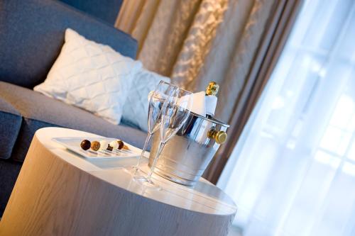 Una cama o camas en una habitación de Hotel Sonnalp