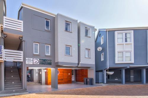 a group of buildings next to each other at Thesen Harbour Town Apartments @ Beautiful Knysna Villas in Knysna