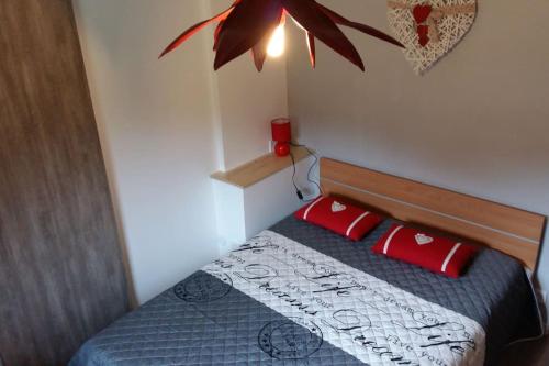 Posteľ alebo postele v izbe v ubytovaní appartement avec balcon au Mont Dore