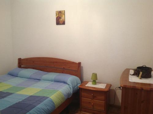 Llit o llits en una habitació de Casa Vacanze Cagnati