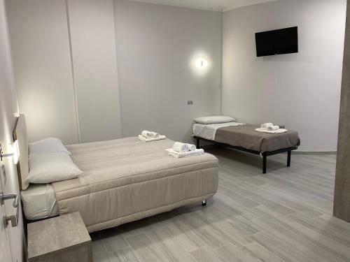 Hotel Prestigeにあるベッド