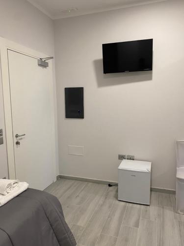 Hotel Prestigeにあるテレビまたはエンターテインメントセンター
