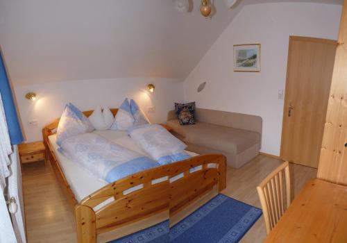 Postel nebo postele na pokoji v ubytování Haus Bauer Appartment I mit Balkon