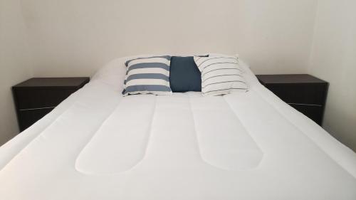 Postel nebo postele na pokoji v ubytování Milca Celeste Nueva Córdoba