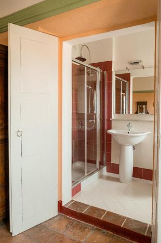 a bathroom with a shower and a sink at Albergo Real Castello in Verduno