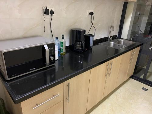 Dapur atau dapur kecil di 2BR Luxury Apartment