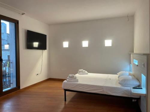 En eller flere senge i et værelse på Luxury Suite