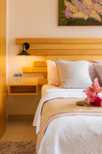 Ein Bett oder Betten in einem Zimmer der Unterkunft ArcoSodi Hotel Boutique