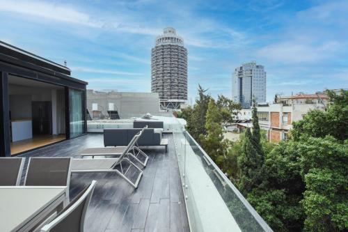a balcony with a view of a building at Touch The Sky by HolyGuest in Tel Aviv