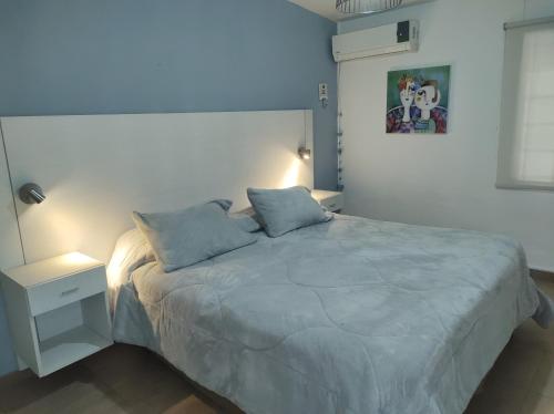 Ένα ή περισσότερα κρεβάτια σε δωμάτιο στο Casa ubicación privilegiada