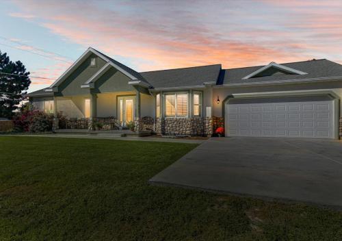 a rendering of a house with a garage at Play & Gather in Luxury,Pets too! Close to it Everything! in Orem