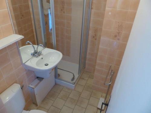 a bathroom with a shower and a sink and a toilet at Studio Le Lavandou, 1 pièce, 2 personnes - FR-1-308-161 in Le Lavandou