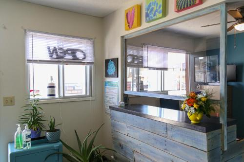 a kitchen with a counter with a flower vase on it at Richter Pass Beach Resort in Osoyoos