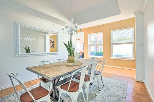 a dining room with a table and chairs at Beautiful Montgomery Home with Lakefront Deck! in Montgomery