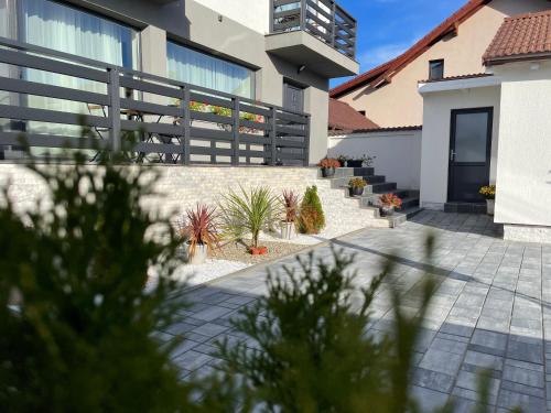 a courtyard of a house with potted plants at Casa Valentina in Cristian