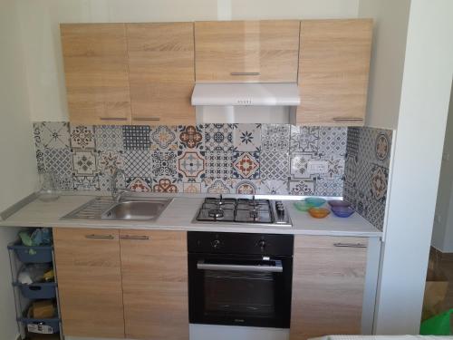 Köök või kööginurk majutusasutuses Casa Rosetta