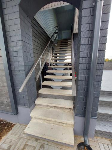 a set of stairs in a building at Navi Apartment in Navi