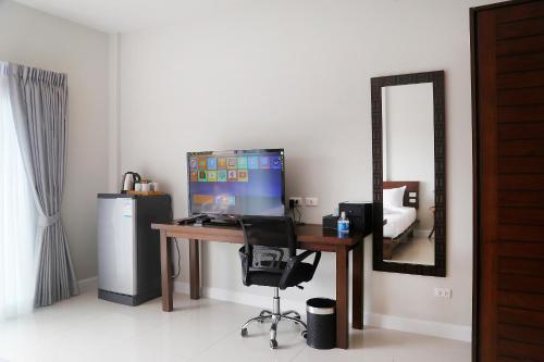 TV a/nebo společenská místnost v ubytování The Langstan Suites