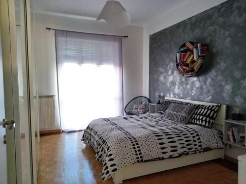 Postel nebo postele na pokoji v ubytování Appartamento Torino Inalpi Arena e Olimpico