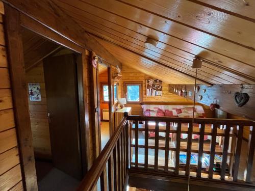 an overhead view of a cabin with a wooden ceiling at Chalet calme cosy Eyne station 2600 in Eyne