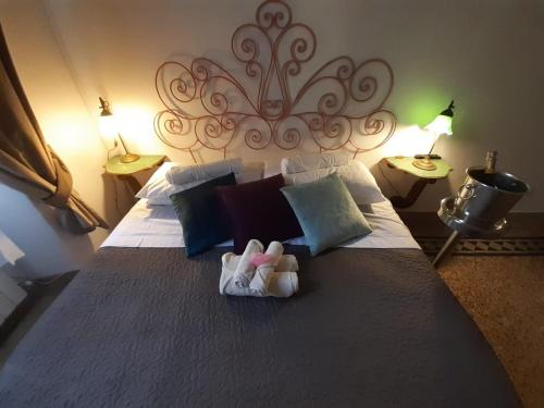 Un pat sau paturi într-o cameră la Epiro Home