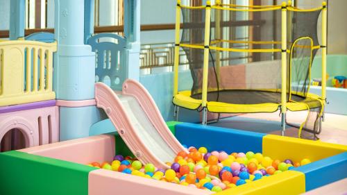 a play set with a slide and balls at Junluxe Hotel Guangzhou Zengcheng-Free Shuttle Bus For Canton Fair in Zengcheng