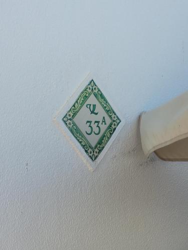 a sticker on the side of a white ceiling at Seagull Rooftop Beach @150 m in Vale do Lobo