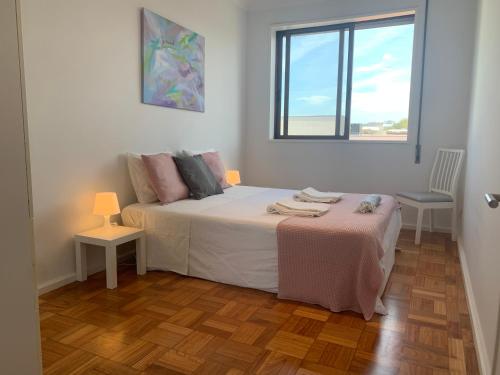 Postel nebo postele na pokoji v ubytování Sunset Guest Home