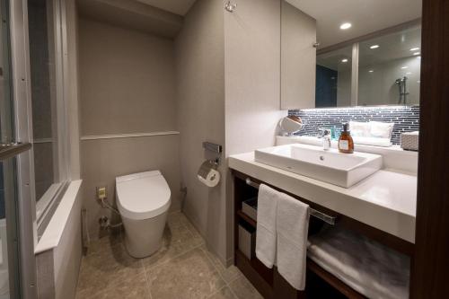 Salle de bains dans l'établissement Hotel GrandConsort Naha