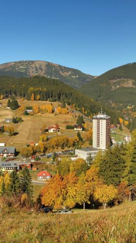 a small town in the middle of a mountain at Hotel Horizont in Pec pod Sněžkou
