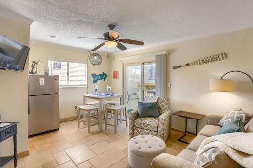 a living room with a kitchen and a dining room at 201 Belleair Beach Club in Clearwater Beach