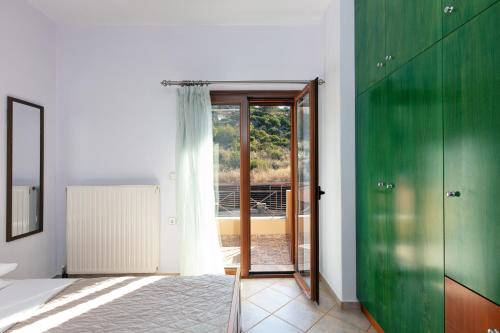 Ένα ή περισσότερα κρεβάτια σε δωμάτιο στο Villa Sevdas