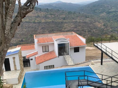 a villa with a view of the mountains at San Gil Villa 48 Palmaire in San Gil
