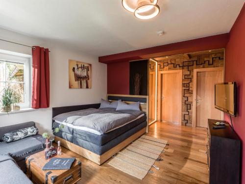 A bed or beds in a room at Bergblick - Mountainview