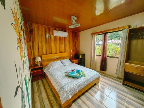 Postel nebo postele na pokoji v ubytování Hotel Casa Gitana Corcovado Tour operador