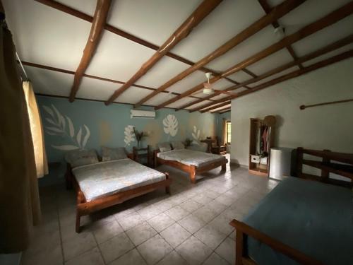 Una cama o camas en una habitación de Hotel Entre Dos Aguas