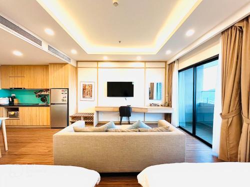 Kuchyň nebo kuchyňský kout v ubytování Quy Nhon Pearl - FLC Sea Tower