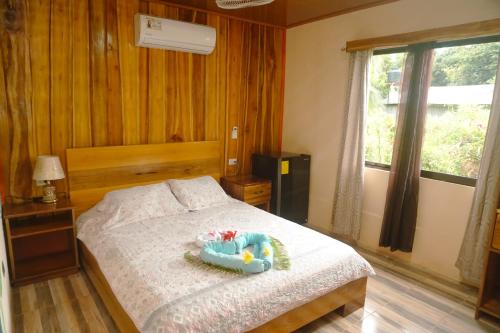 Katil atau katil-katil dalam bilik di Hotel Casa Gitana Corcovado Tour operador