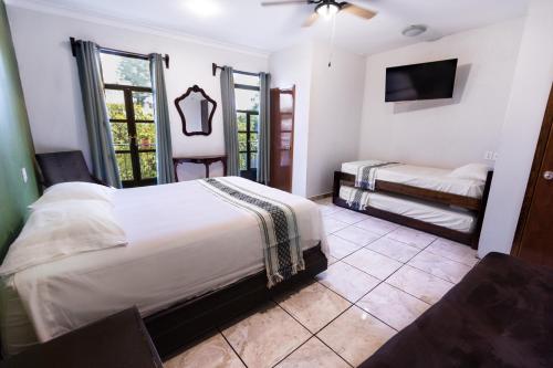 Postel nebo postele na pokoji v ubytování Habitación privada en el centro de Tequila