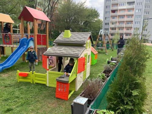 a childrens playground with a small play house at Penzion Set in Košice