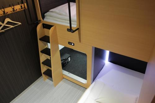 Ένα ή περισσότερα κρεβάτια σε δωμάτιο στο The Lodge Moiwa 834