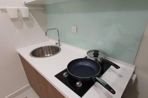 Kuchyň nebo kuchyňský kout v ubytování KOZI Square New SGH Cozy Home 7A